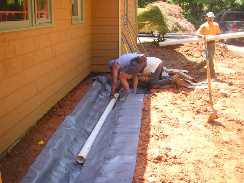 properly built french drain before gravel placement